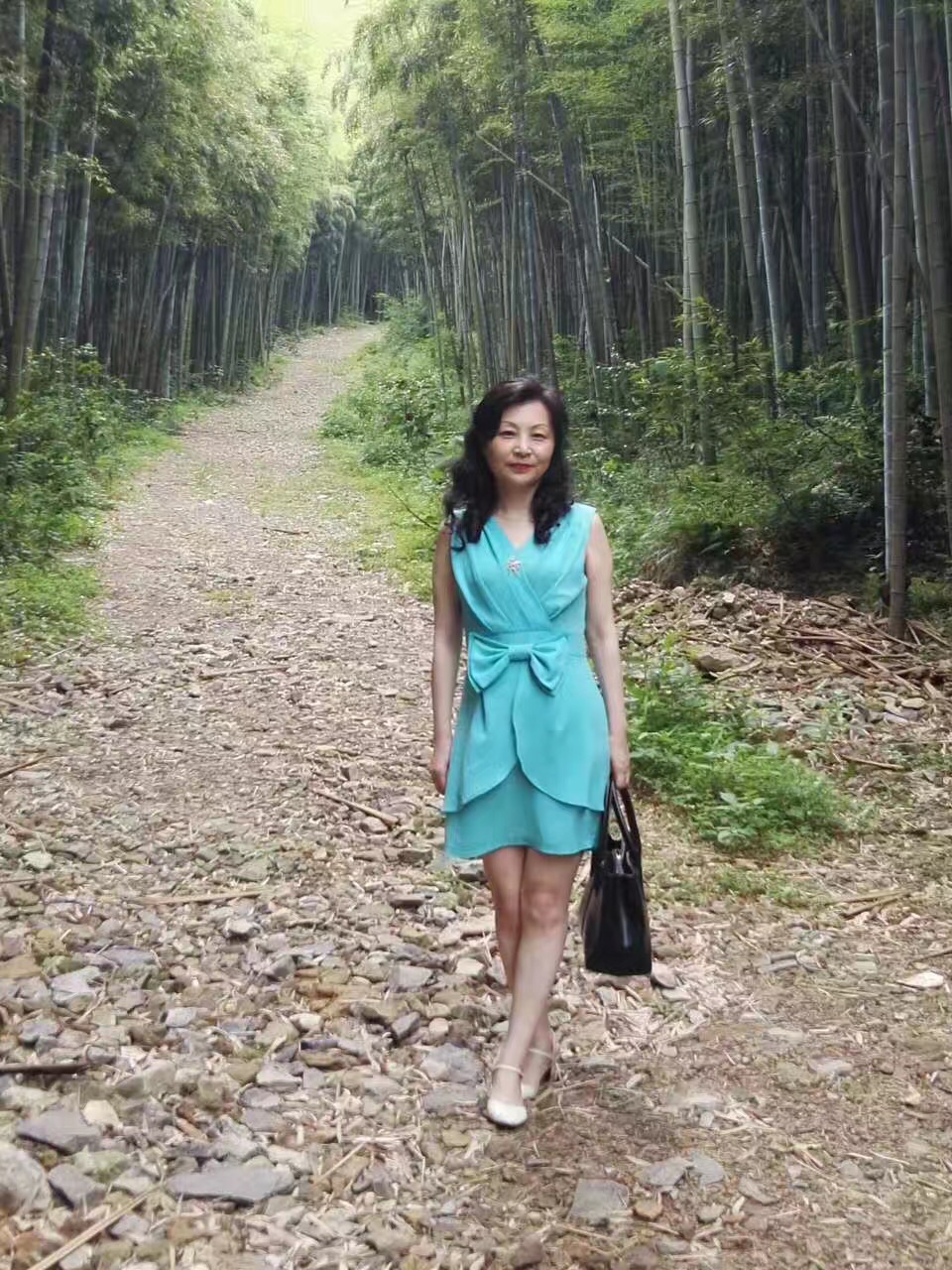 葛为群